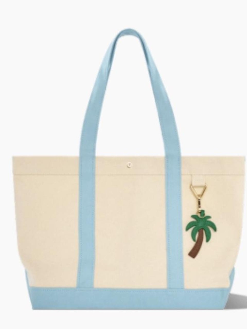 BaubleBar Large Canvas Tote with Light Blue Straps and Palm Tree Charm.